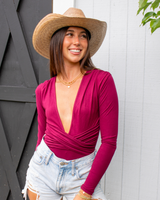 -Burgundy color
-Deep V neck
-Long sleeve
-Crisscross around waist
-Comes in white, black and burgundy. 
ST363 BSUIT RED