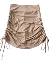 - Cinched Detail on Sides
- Built in Shorts
- Elastic Waistband
- Comes in 3 Colors
FA002391 SKIRT TAN