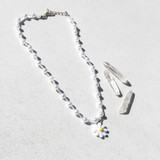 -LINED WITH PEARLS
-LINED WITH CLEAR BEADS
-DAISY CHARM
-SILVER CLASP 
1221 PEARL DAISY CHOKER 