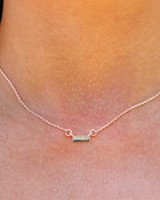 -Gold
-Horizontal bar
-Lightweight
-Medium length 
 GOLD BAR CHARM NECKLACE